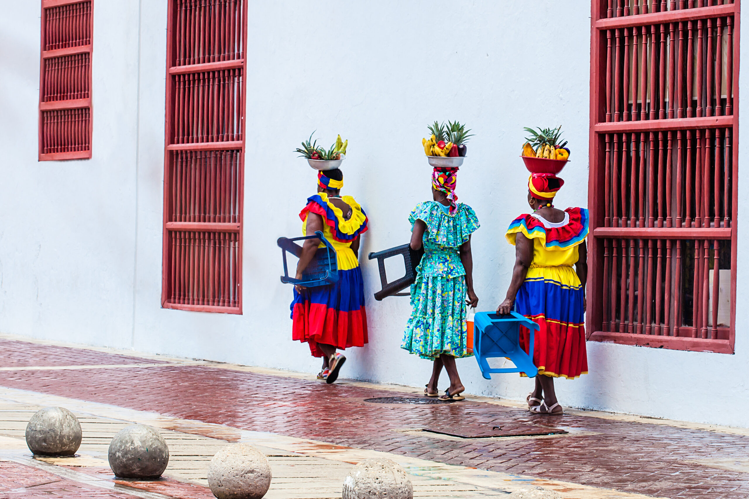 CARTAGENA DE INDIAS, COLOMBIA - AUGUST, 2018: Traditional fruits street vendor in Cartagena de Indias called Palenquera